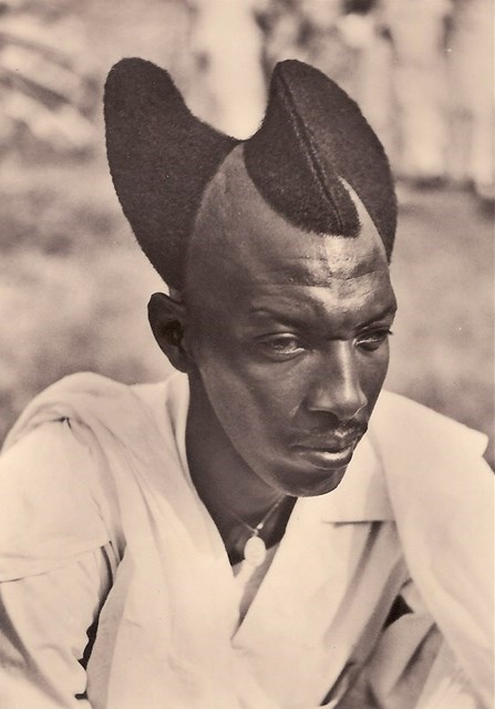 Rwandan man with Amasunzu hairstyle, 1923.